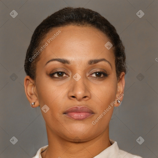 Joyful latino young-adult female with short  brown hair and brown eyes