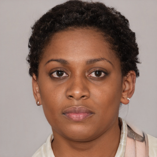 Neutral black young-adult female with short  brown hair and brown eyes