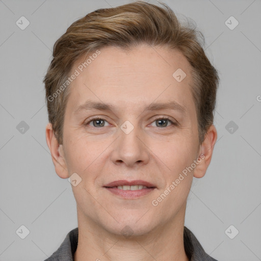 Joyful white adult female with short  brown hair and grey eyes