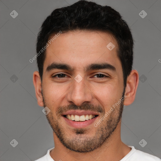 Joyful white young-adult male with short  brown hair and brown eyes