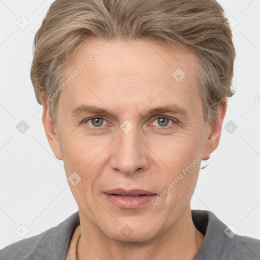 Joyful white adult male with short  brown hair and grey eyes