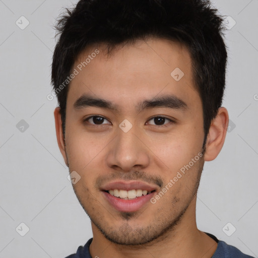 Joyful asian young-adult male with short  brown hair and brown eyes