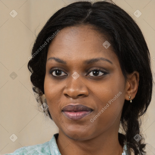 Joyful black young-adult female with medium  black hair and brown eyes