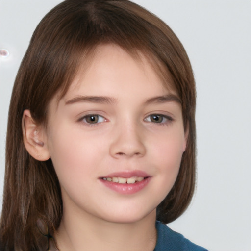 Joyful white child female with long  brown hair and brown eyes