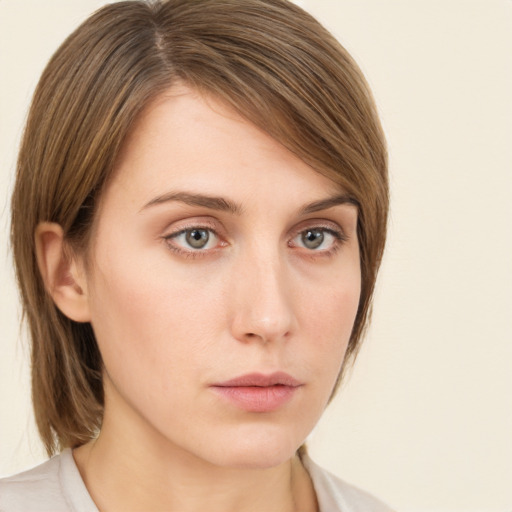 Neutral white young-adult female with medium  brown hair and green eyes