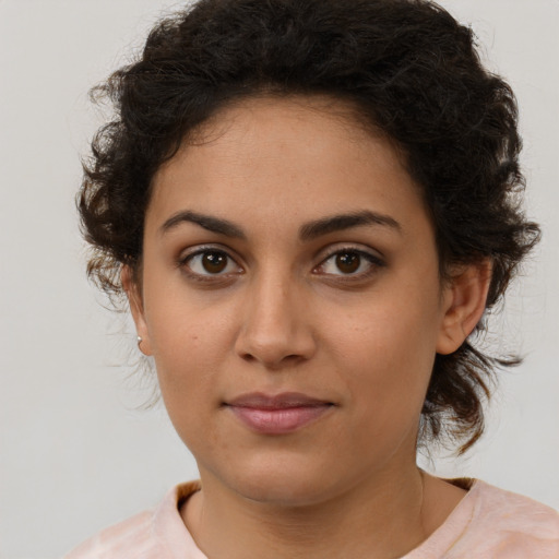 Neutral latino young-adult female with medium  brown hair and brown eyes