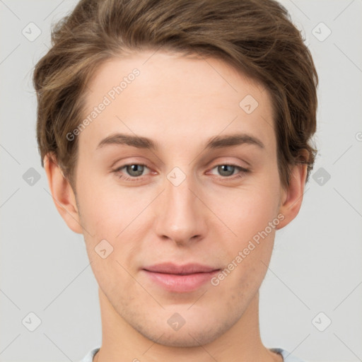 Joyful white young-adult female with short  brown hair and grey eyes