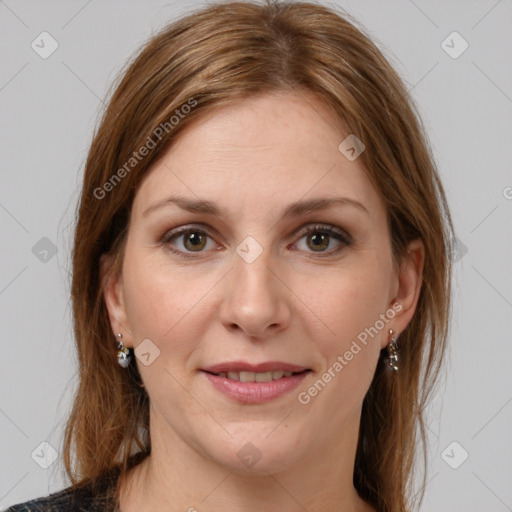 Joyful white young-adult female with medium  brown hair and green eyes