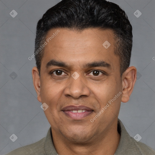 Joyful latino adult male with short  black hair and brown eyes