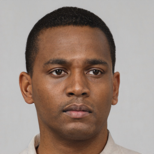 Neutral black young-adult male with short  brown hair and brown eyes