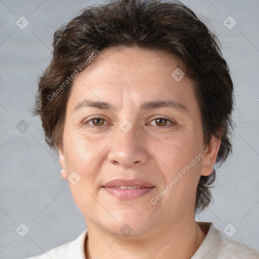 Joyful white adult female with short  brown hair and brown eyes