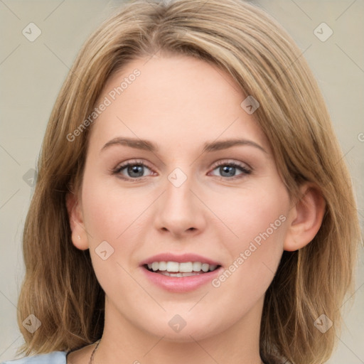 Joyful white young-adult female with medium  brown hair and green eyes