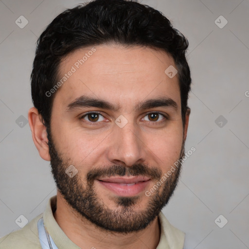 Joyful white young-adult male with short  black hair and brown eyes