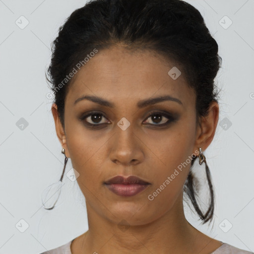 Neutral black young-adult female with short  brown hair and brown eyes