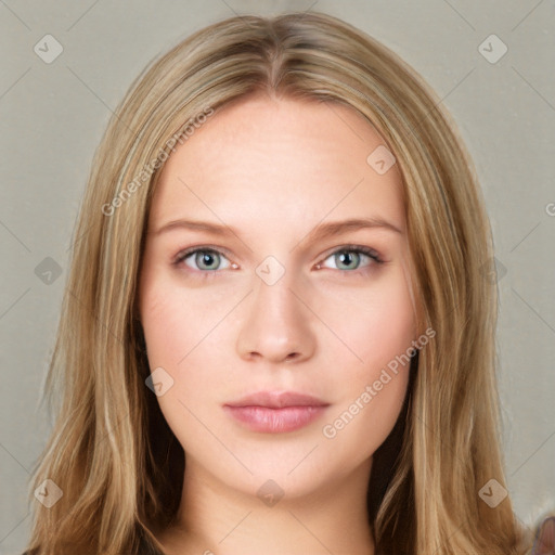 Neutral white young-adult female with long  brown hair and brown eyes