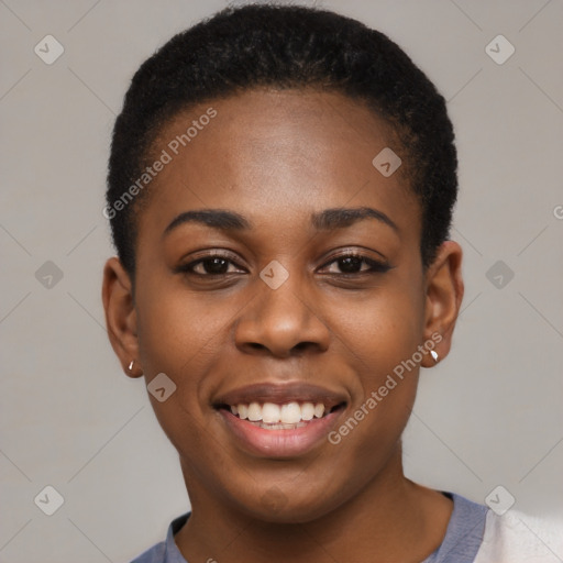 Joyful black young-adult female with short  black hair and brown eyes