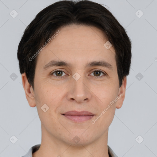 Joyful white adult male with short  brown hair and brown eyes