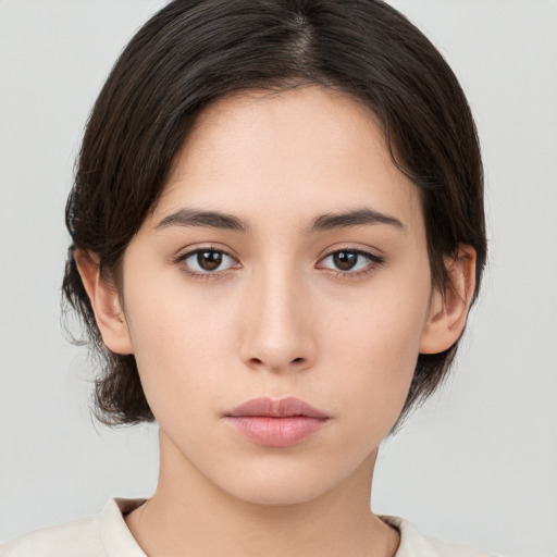 Neutral white young-adult female with medium  brown hair and brown eyes