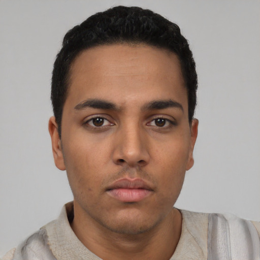 Neutral latino young-adult male with short  black hair and brown eyes