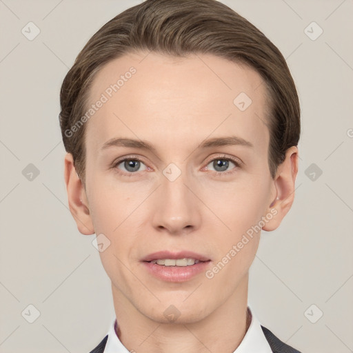 Joyful white young-adult female with short  brown hair and grey eyes