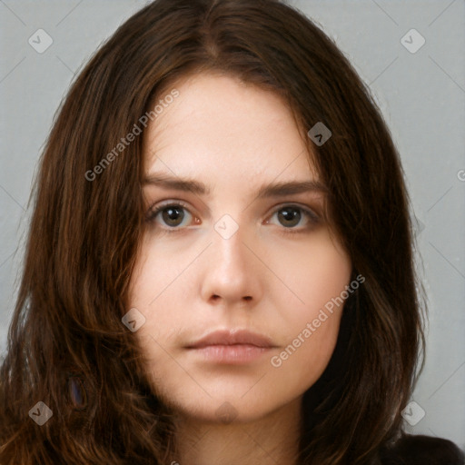 Neutral white young-adult female with long  brown hair and brown eyes