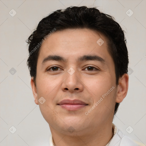 Joyful latino young-adult male with short  brown hair and brown eyes