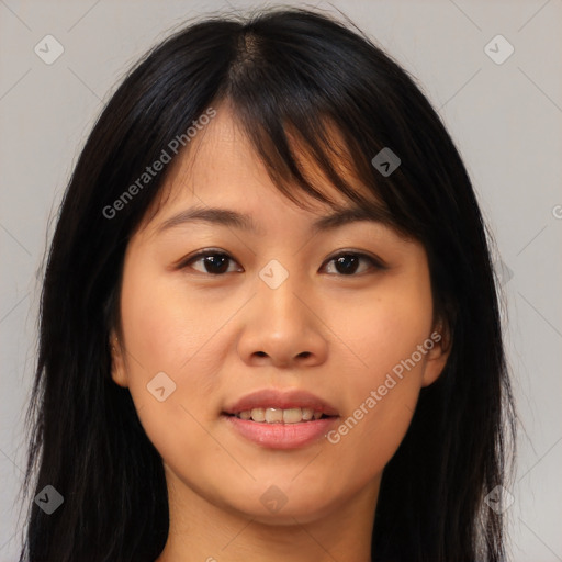 Joyful asian young-adult female with long  brown hair and brown eyes