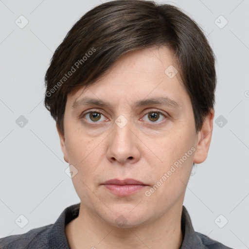 Joyful white adult male with short  brown hair and grey eyes