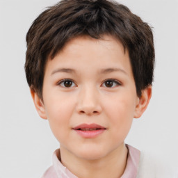 Joyful white child male with short  brown hair and brown eyes