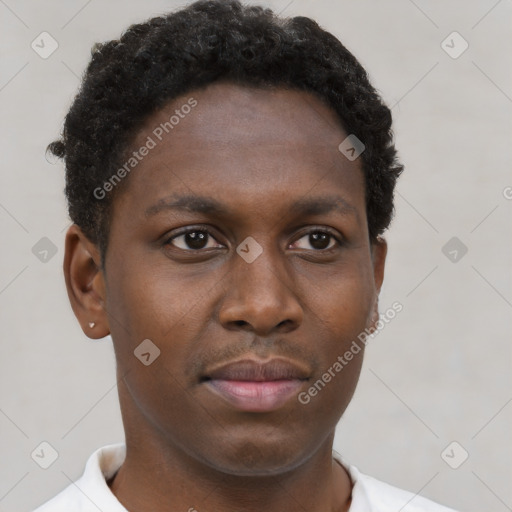 Neutral black young-adult male with short  brown hair and brown eyes