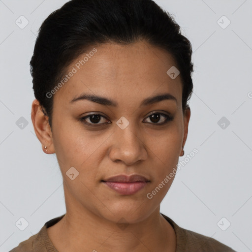 Joyful latino young-adult female with short  brown hair and brown eyes