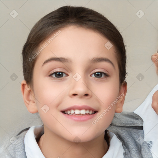 Joyful white child female with short  brown hair and brown eyes