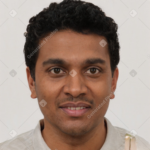 Joyful black young-adult male with short  black hair and brown eyes