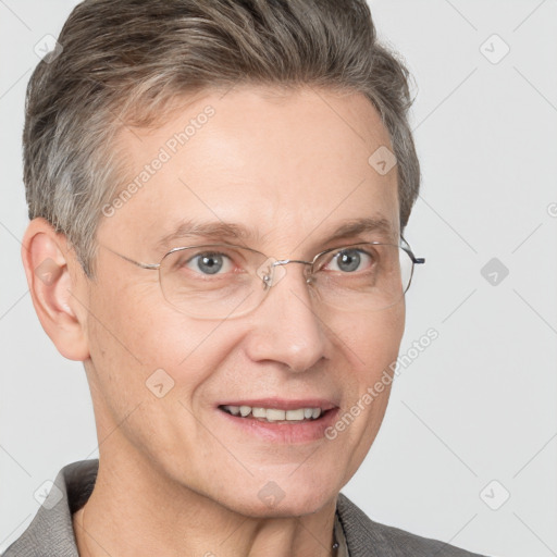 Joyful white adult male with short  brown hair and grey eyes