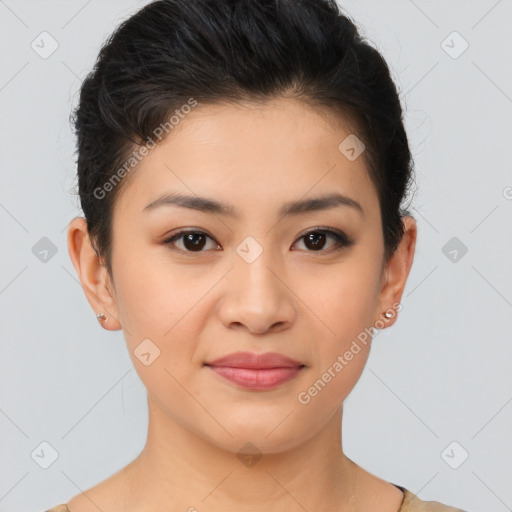 Joyful asian young-adult female with short  brown hair and brown eyes