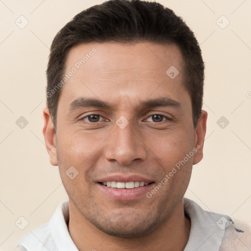 Joyful white young-adult male with short  brown hair and brown eyes