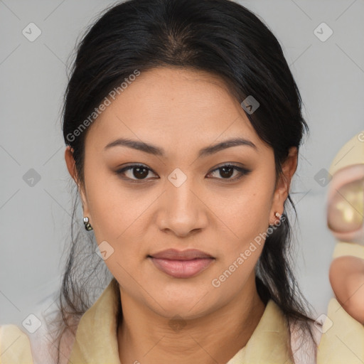 Joyful latino young-adult female with medium  brown hair and brown eyes