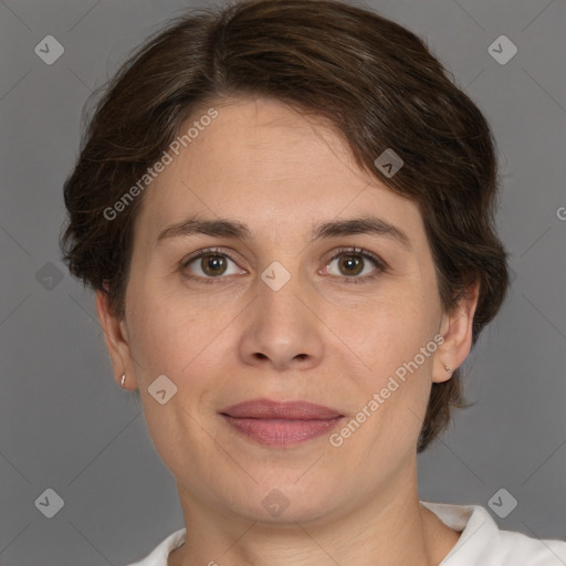 Joyful white adult female with short  brown hair and brown eyes