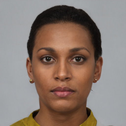 Neutral latino young-adult female with short  brown hair and brown eyes