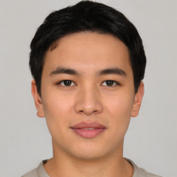 Neutral asian young-adult male with short  black hair and brown eyes