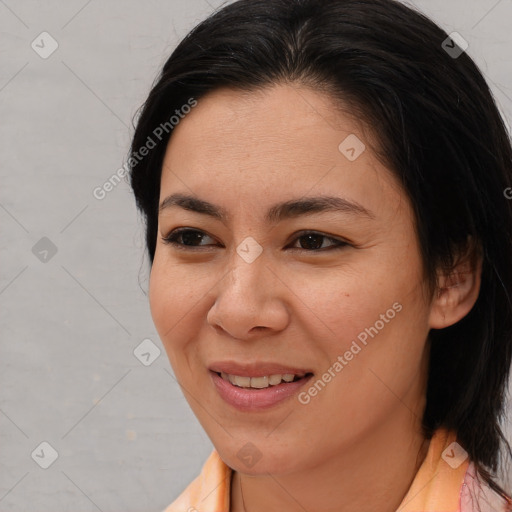 Joyful latino young-adult female with medium  brown hair and brown eyes