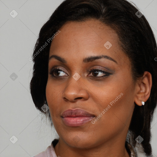 Joyful black young-adult female with medium  black hair and brown eyes