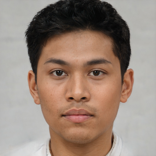 Neutral asian young-adult male with short  brown hair and brown eyes