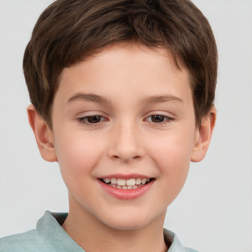 Joyful white child male with short  brown hair and brown eyes