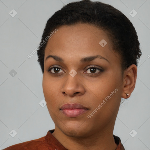 Neutral black young-adult female with short  black hair and brown eyes