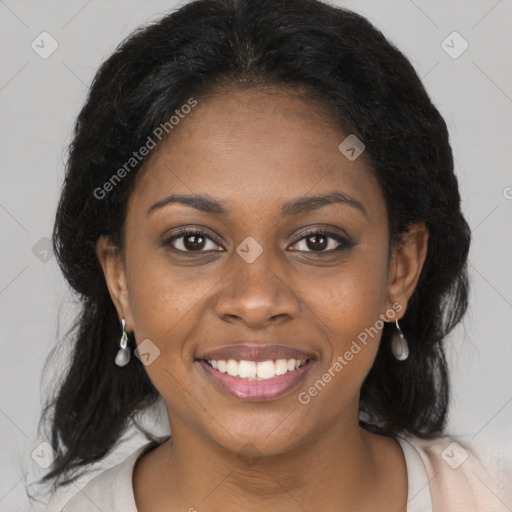 Joyful black young-adult female with medium  brown hair and brown eyes