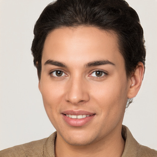 Joyful white young-adult female with short  brown hair and brown eyes