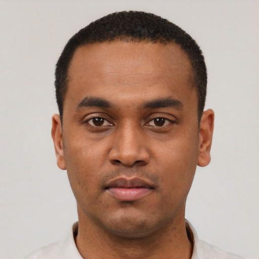Neutral black young-adult male with short  black hair and brown eyes