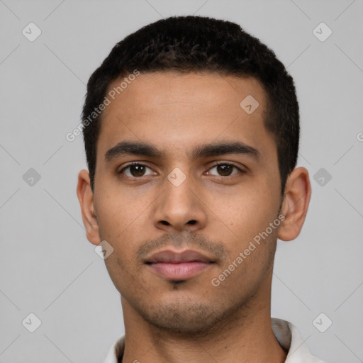 Neutral latino young-adult male with short  black hair and brown eyes