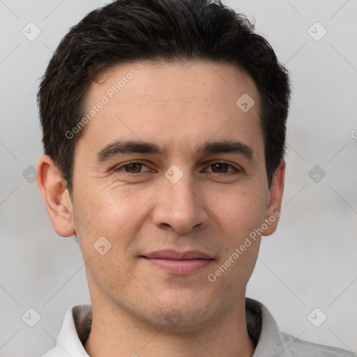 Joyful white young-adult male with short  brown hair and brown eyes